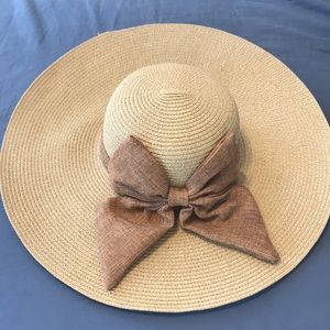 Brown floppy beach/ sun hat with bow
